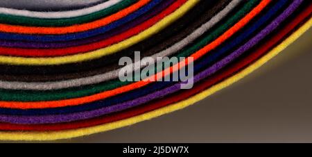 Several colored felt texture background. Assorted color felt fabric sheets, patchwork, sewing DIY craft Stock Photo