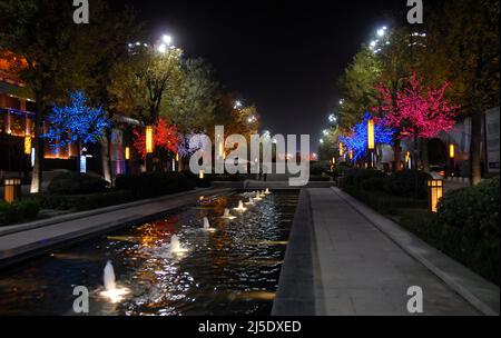 Xian, Shaanxi Province, China: Fountains in Xian, part of the Grand Tang Dynasty Ever-bright City at night. Celebrating the Tang Dynasty. Stock Photo