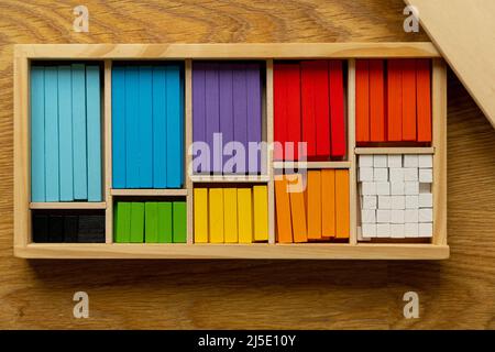 Counting  math rods organized in wooden box. manipulative material for maths Stock Photo