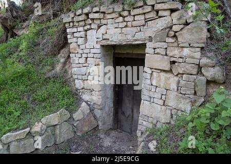 hiking through a wine cellar alley in Lower Austria Stock Photo