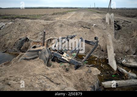 KYIV REGION, UKRAINE - APRIL 21, 2022 - The remains of vehicles are pictured near Bervytsia, a village liberated from Russian occupiers, Kyiv Region, Stock Photo