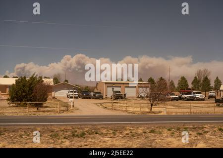 Las Vegas, USA. 22nd Apr, 2022. The Calf Canyon fire, seen from a westbound Amtrak train, burns near Las Vegas, New Mexico on April 22, 2022. The fire has burned over 3,000 acres of land and several counties in New Mexico are under a mandatory evacuation status. (Photo by Max Herman/Sipa USA) Credit: Sipa USA/Alamy Live News Stock Photo