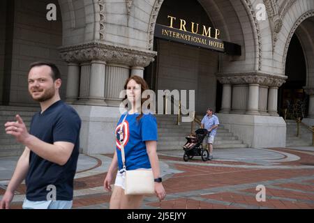 Washington, USA. 22nd Apr, 2022. People walk by the Trump International Hotel, in Washington, DC, on Friday, April 22, 2022. (Graeme Sloan/Sipa USA) Credit: Sipa USA/Alamy Live News Stock Photo