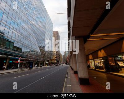 London, Greater London, England, April 13 2022: Victoria Street in Westminster in the evening showing the covered pavement area. Stock Photo