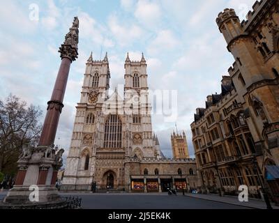 London, Greater London, England, April 13 2022: Westminster Abbey entrance in the evening with Deans Yard right. Stock Photo