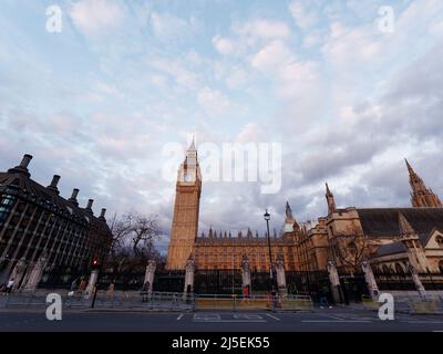 London, Greater London, England, April 13 2022: Houses of Parliament in Westminster with a dramatic evening sky. Bridge Street left. Stock Photo