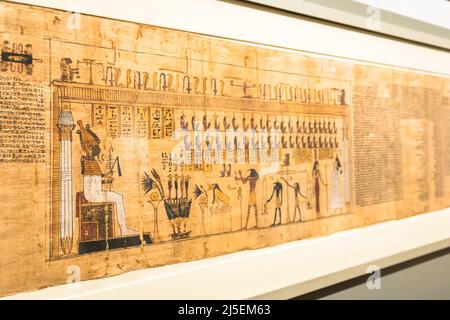 TURIN, ITALY - CIRCA MAY 2021: ancient Egyptian papyrus with hieroglyphic funerary text. Circa 1550 BC antique manuscript. Stock Photo