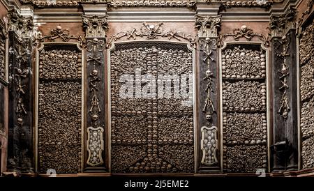 Milan, Italy - Circa August 2020. Ossuary Chapel in San Bernardino alle Ossa Church. Every architectural detail is clad in human bones. Stock Photo