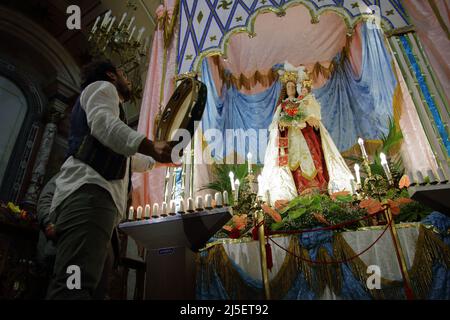 April 22, 2022, Pagani, Campania/Salerno, Italy: Pagani, Salerno, Italy - April 22, 2022 :Musicians seen sing, play tammorra and guitar during feast of Santa Maria Incoronata del Carmine called ''delle Galline''.It is a religious and civil event that takes place annually in Pagani (Salerno) from Friday of the eighth of Easter to the following Monday. The festival, celebrated in the homonymous sanctuary, is organized by the Carmelite Fathers of the sanctuary itself and by the Archconfraternity of the Madonna delle Galline. Tradition tells of a painting depicting the image of the Madonna, found Stock Photo