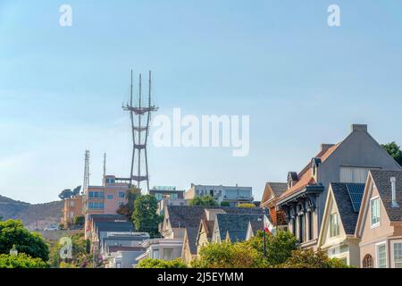 View of a telecom tower near the residential buildings in the suburbs of San Francisco, California Stock Photo