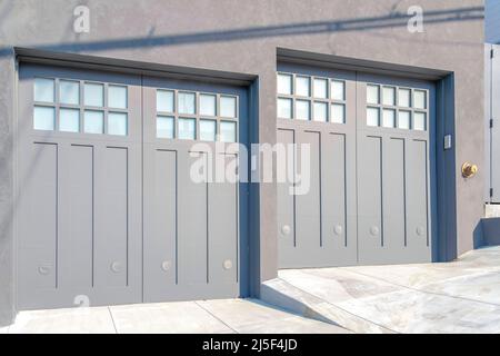 Double garage doors with gray exterior at San Francisco, California Stock Photo