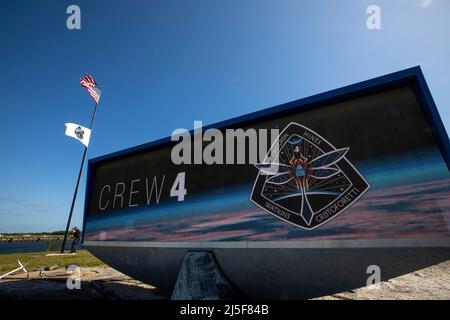 The News Center countdown clock is shown as NASAs SpaceX Crew-4 flag is raised at NASAs Kennedy Space Center in Florida on April 19, 2022. The SpaceX Falcon 9 with Crew Dragon, named Freedom by the Crew-4 crew, atop is scheduled to lift off Saturday, April 23, 2002, at 5:26 p.m. EDT, from Launch Complex 39A at Kennedy. Dragon will carry NASA astronauts Kjell Lindgren, Bob Hines, and Jessica Watkins, and ESA (European Space Agency) astronaut Samantha Cristoforetti to the International Space Station as part of NASAs Commercial Crew Program. Mandatory Credit: Cory Huston/NASA via CNP Stock Photo