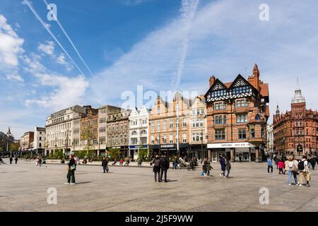 Shops around Old Market Square busy with shoppers in the city centre. Nottingham, Nottinghamshire, England, UK, Britain Stock Photo