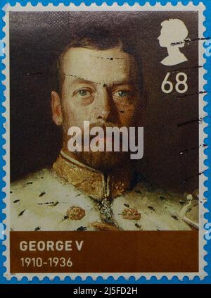 Photo of a stamp featuring a portrait painting of George V from the Queen Elizabeth II 2012 Diamond Jubilee series of the House of Windsor Stock Photo