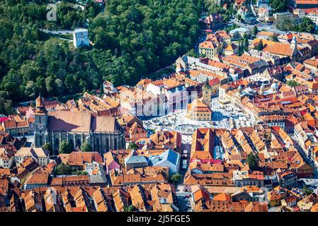 Brasov, Romania - Scenic aerial view from the top of Tampa Mt. with Main Square and Black Church, Transylvania travel spotlight. Stock Photo