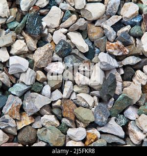 Colored pebbles texture background, decorative small stones texture wallpaper Stock Photo