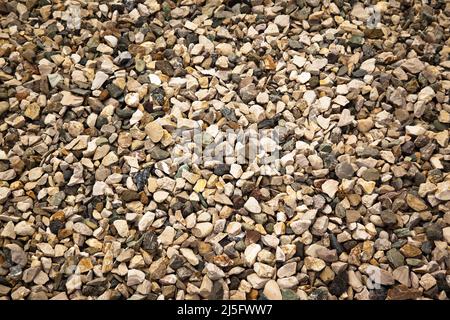 Colored pebbles texture background, decorative small stones texture wallpaper Stock Photo