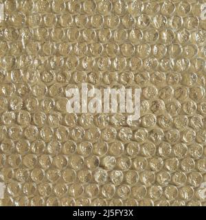 On corrugated cardboard paper plastic air bubble protection foil wrap texture background, air bubble packing texture Stock Photo
