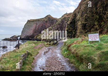 Entrace to Cushendun Caves along the north Antrim coastline in Northern Ireland - a filming location for TV series Game of Thrones. Stock Photo