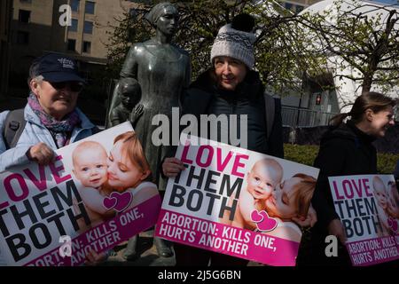 Edinburgh, UK, 23rd April 2022. Pro-Life campaigners hold placards, as they face Pro-Choice campaigners across Lothian Road, on the anniversary day of the 1967 Abortion Act becoming law. A private membersÕ bill has been proposed for Scottish Parliament to stop Pro-Life campaigning outside hospitals. In Edinburgh, UK, 23 April 2022.