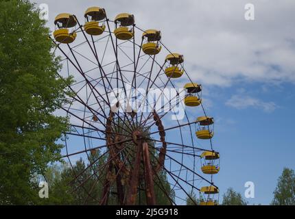 Abandoned ferris wheel in amusement park in Pripyat, Stock Photo