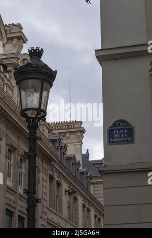 Paris, France: Latin quarter, lamp post and street sign of Place de la Sorbonne (Sorbonne Square), opened in 1639 and linked to Sorbonne universities Stock Photo