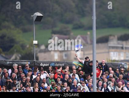 23rd April 2022, The Recreation Ground, Bath, Somerset, England; Gallagher Premiership Rugby, Bath versus Northampton; a fan holds a Bath flag aloft in the stands Credit: Action Plus Sports Images/Alamy Live News Stock Photo