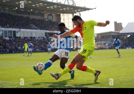 Nottingham Forest's Scott McKenna crosses the ball in but is blocked by Peterborough United's Kwame Poku during the Sky Bet Championship match at Weston Homes Stadium, Peterborough. Picture date: Saturday April 23, 2022. Stock Photo