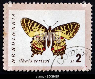 BULGARIA - CIRCA 1962: a stamp printed in the Bulgaria shows Eastern Festoon, Thais Cerisyi, Butterfly, circa 1962 Stock Photo