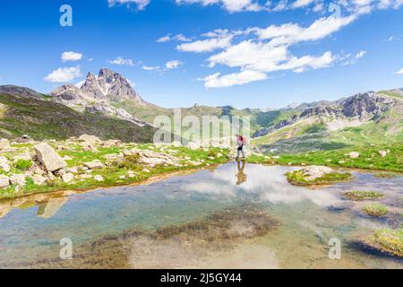 View of Pic du Midi d'Ossau near Espelunziecha lake, Formigal, Tena valley, Huesca, Spain Stock Photo