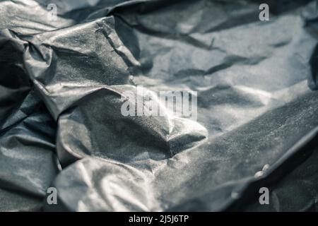 Abstract real paper surface background. Aluminum Platinum Silver foil. Wrinkled crumpled folds bend crush crease kink. Crystal, polygonal texture wave Stock Photo
