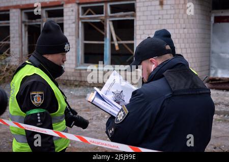 Ukraine police investigators are at work in the village of Bervytsia liberated from Russian invaders, Kyiv Region, northern Ukraine, April 21, 2022. Photo by Yehven Kotenko/Ukrinform/ABACAPRESS.COM Stock Photo