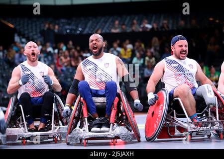 Netherlands. 19th Apr, 2022. Retired U.S. Army Staff Sgt. Shawn Runnells, Retired U.S. Army Specialist Brent Garlic and Retired U.S. Navy Hospital Corpsman Third Class Michael Diaz competes in the wheelchair rugby match against Team United Kingdom during the Invictus Games The Hague, Netherlands, April 19, 2022. Credit: U.S. Army/ZUMA Press Wire Service/ZUMAPRESS.com/Alamy Live News Stock Photo