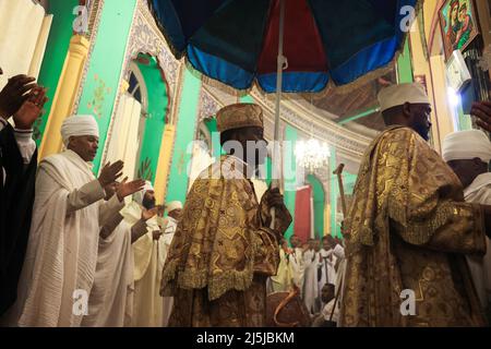 Ethiopian Orthodox church clergy pray during an Easter eve vigil at the Bole Medhanialem church in Addis Ababa, Ethiopia, April 23, 2022. Picture taken April 23, 2022. REUTERS/Tiksa Negeri