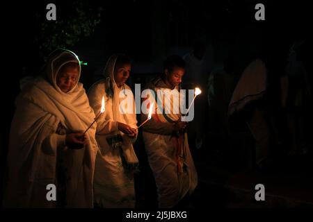 Ethiopian Orthodox church worshipers attend an Easter eve vigil at the Bole Medhanialem church in Addis Ababa, Ethiopia, April 23, 2022. Picture taken April 23, 2022. REUTERS/Tiksa Negeri