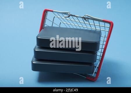 A stack of hard drives in a basket. Stock Photo