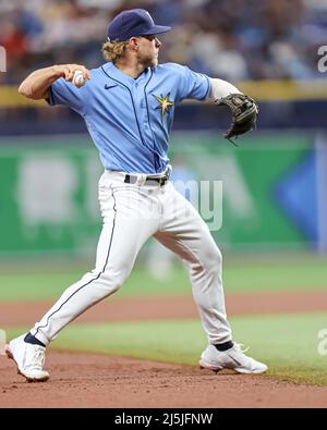 St. Petersburg, United States. 24th May, 2022. St. Petersburg, FL. USA;  Tampa Bay Rays second baseman Taylor Walls (6) turns the double play  getting Miami Marlins first base coach Keith Johnson (99)