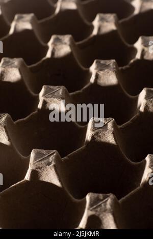 Abstract background. frame geometry. Egg packaging. Paper tray for domestic eggs. Beige and grey. Minimalism. Paper packaging egg carton Stock Photo