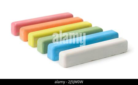 Row of colorful chalks isolated on white Stock Photo