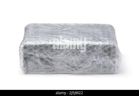 Front view of packaging box wrapped in plastic bubble wrap isolated on white Stock Photo