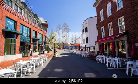 WESTPORT, CT, USA - APRIL 22, 2022: View from Church Lane in beautiful spring day with restaurants table outside Stock Photo