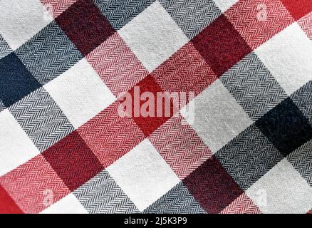 Checkered fabric in navy blue, red and white Stock Photo
