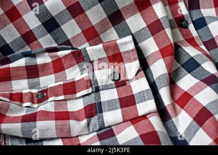 Men's plaid shirt in navy blue, red and white Stock Photo