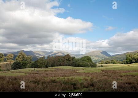 Seat Sanadal and Fairfield above Grasmere viewed fromthe slopes  Letterbarrow near Hawkshead the Lake District Cumbria England Stock Photo