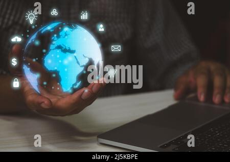 Man hand virtual world icon. Communication and use of modern Internet technology  Social Networking online marketing digital online.Business metaverse Stock Photo