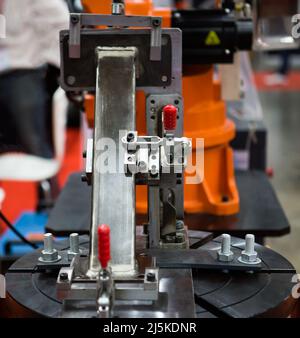 Industrial welding turn table with clamp fixing in construction industry.. Stock Photo