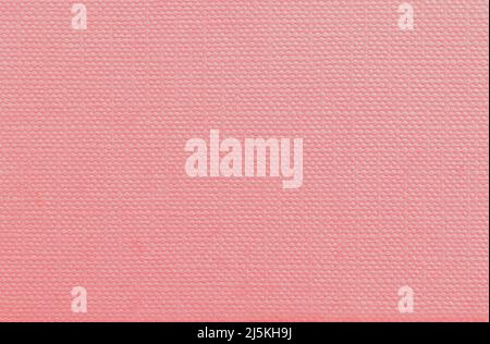 Pale pink or peach colored grunge effect paper wall texture as background Stock Photo
