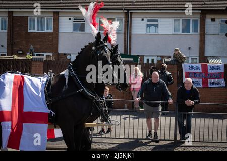 Manchester, UK. 24th Apr, 2022. The public line the streets as the annual St Georges Day parade passes through the city. Hundreds of people join in the annual celebration which marks the death of the patron Saint Of England.ÊAndy Barton/Alamy Live News Credit: Andy Barton/Alamy Live News Stock Photo