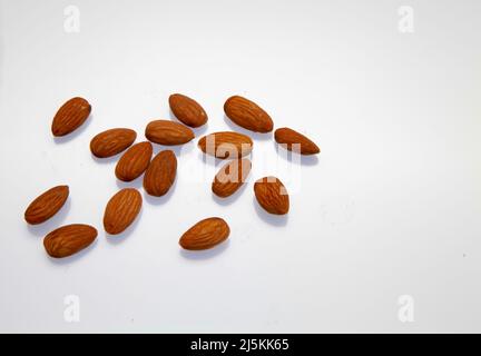 Almonds against a white background April 2022 Stock Photo