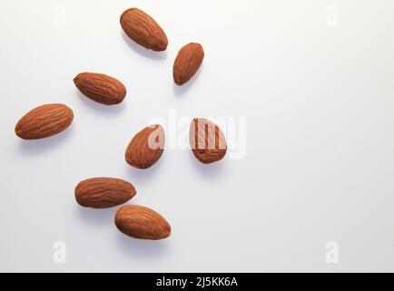 Almonds against a white background April 2022 Stock Photo